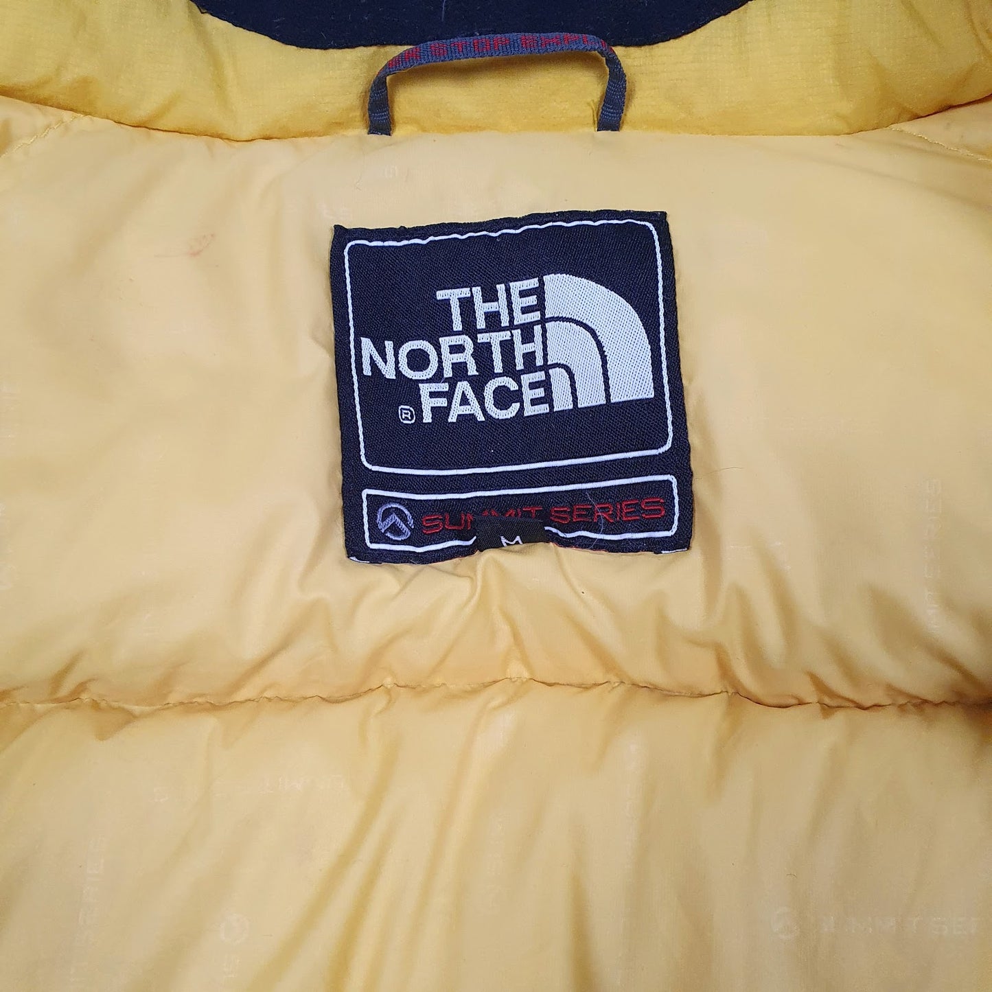 Mens Yellow The North Face Summit Series Baltoro 800  Coat