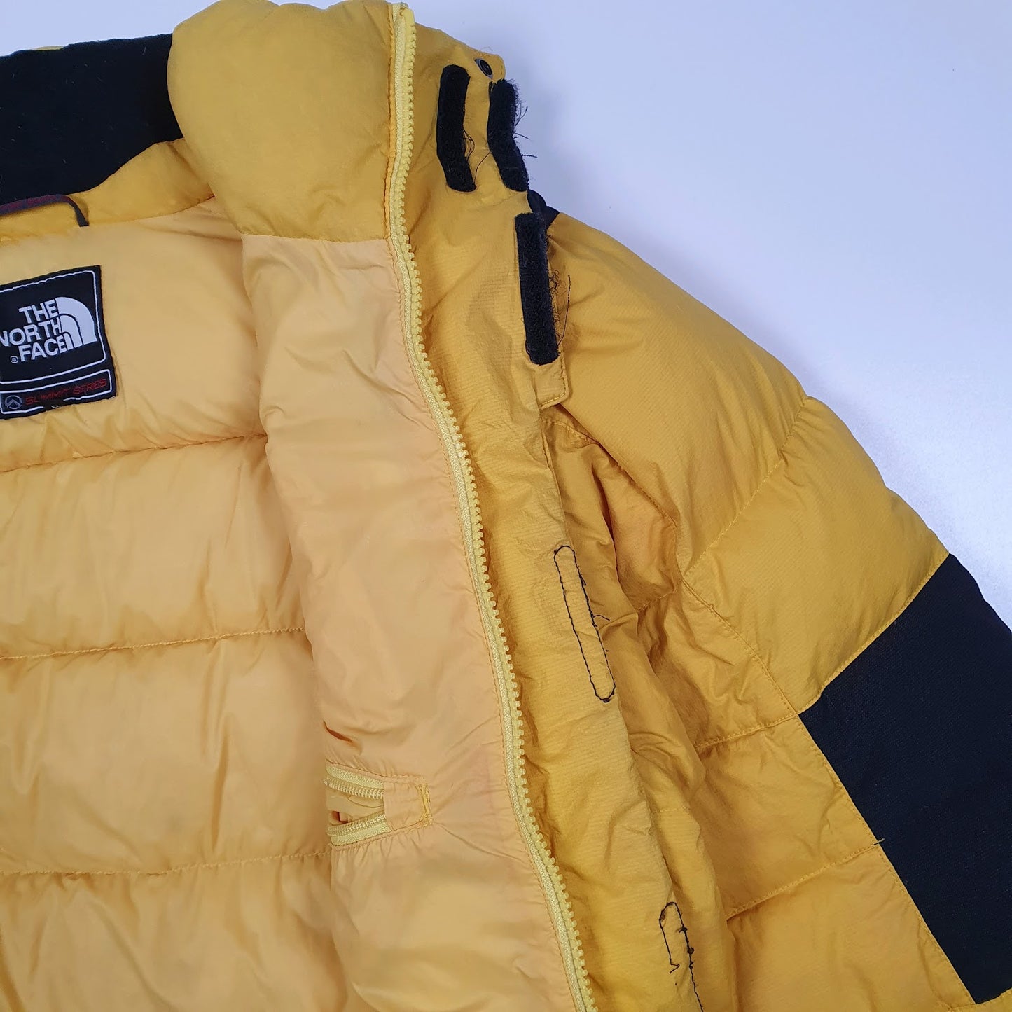 Mens Yellow The North Face Summit Series Baltoro 800  Coat