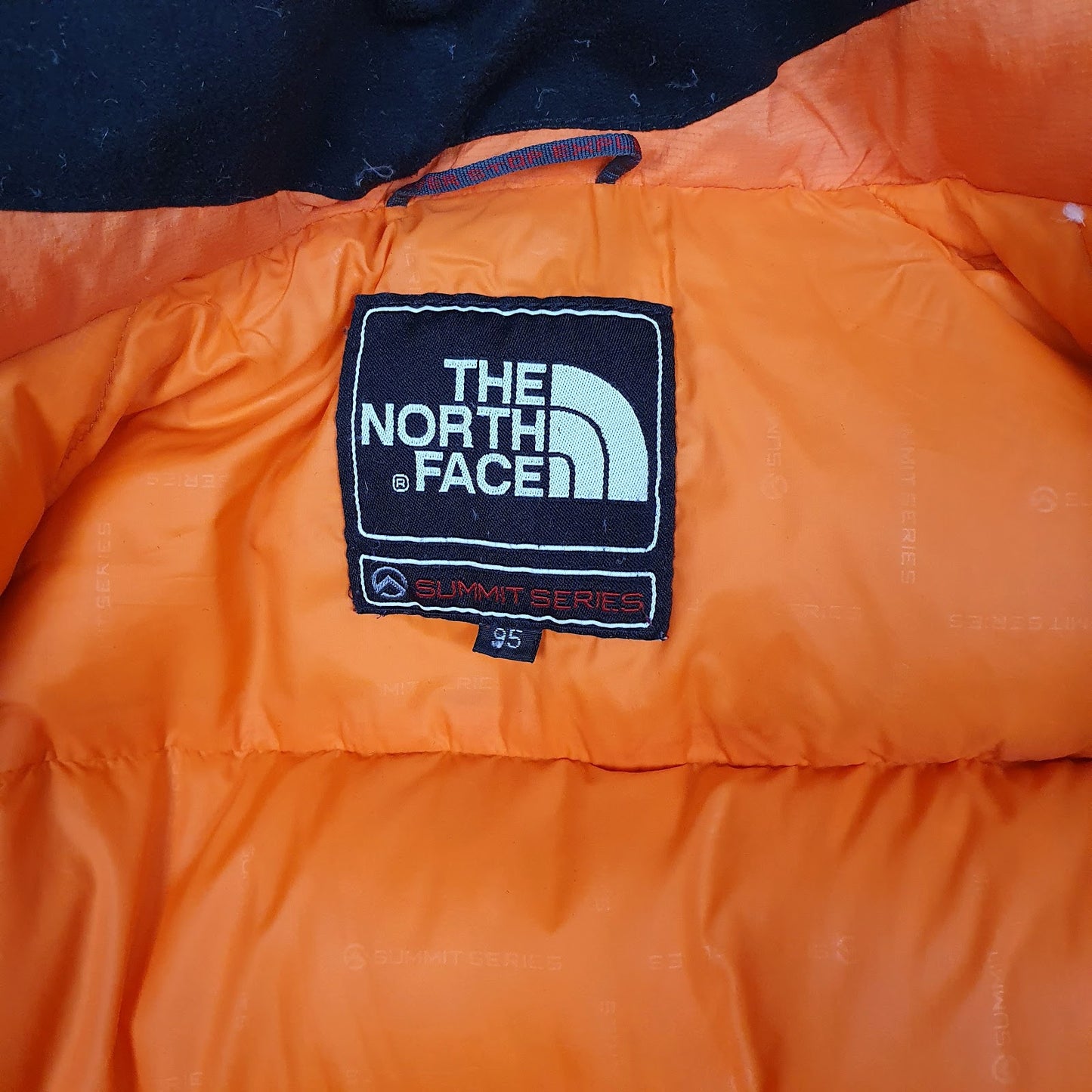 Mens Orange The North Face Summit Series Baltoro  Coat