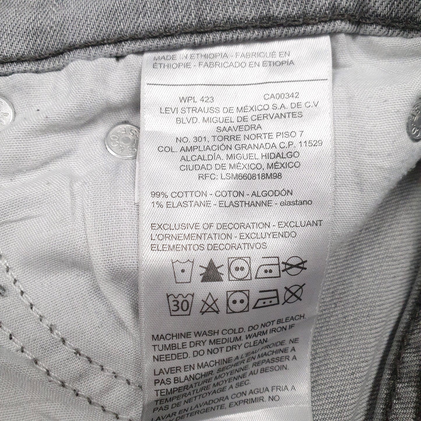 Mens Grey Levis Faint stain on the front left and back right.  Jeans