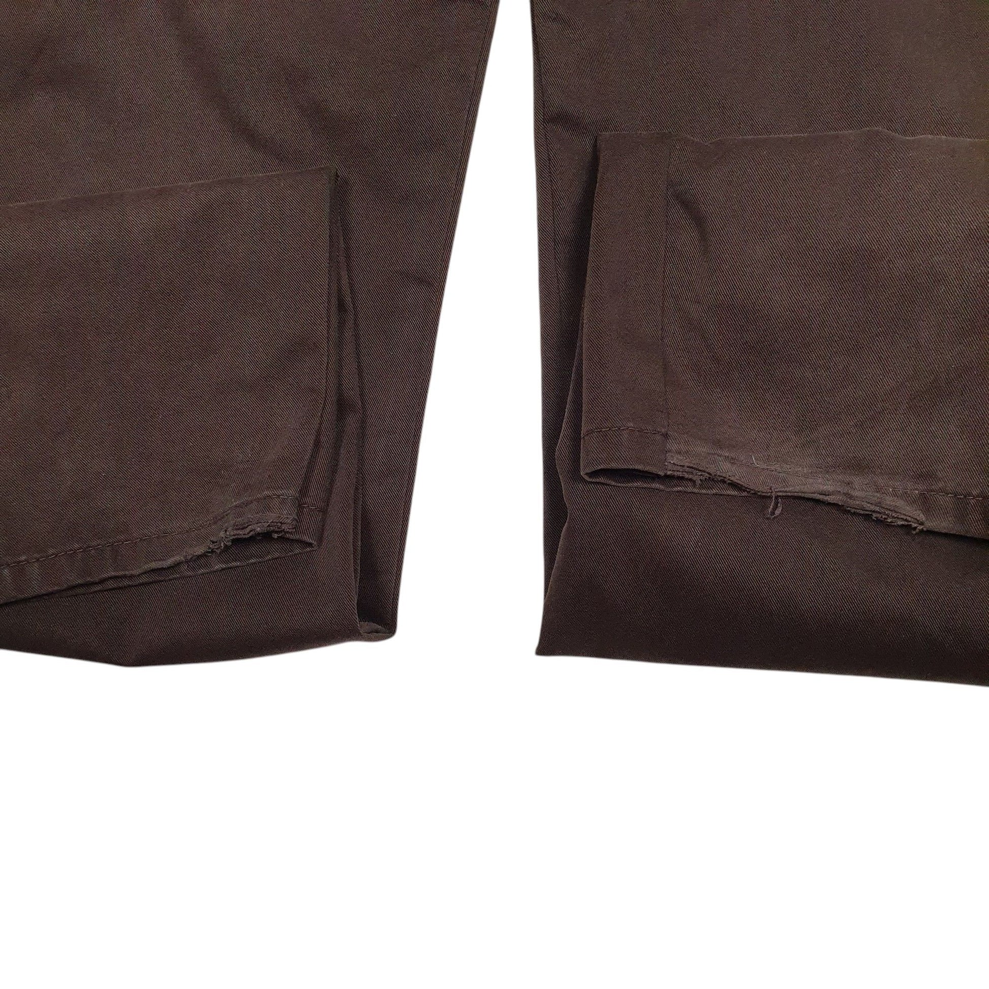 Mens Brown Carhartt Trousers altered to slim fit. Minor damage to back of hems. Tags very worn down, tagged W33 but measure W36.  Trousers