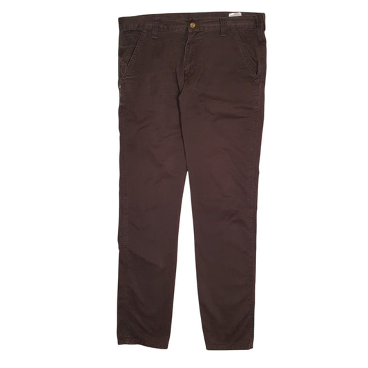 Mens Brown Carhartt Trousers altered to slim fit. Minor damage to back of hems. Tags very worn down, tagged W33 but measure W36. Chino Trousers