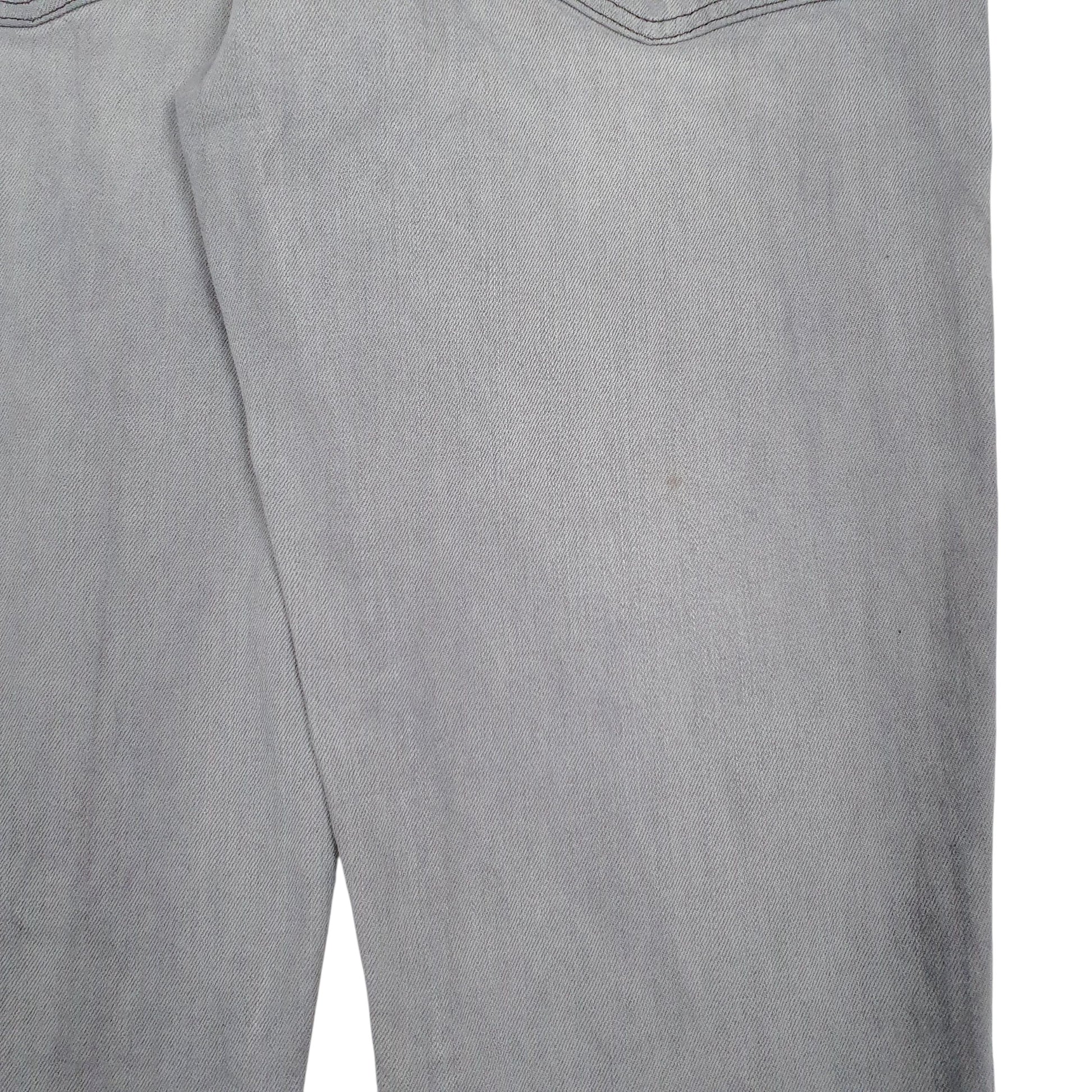 Mens Grey Levis Faint stain on the front left and back right.  Jeans