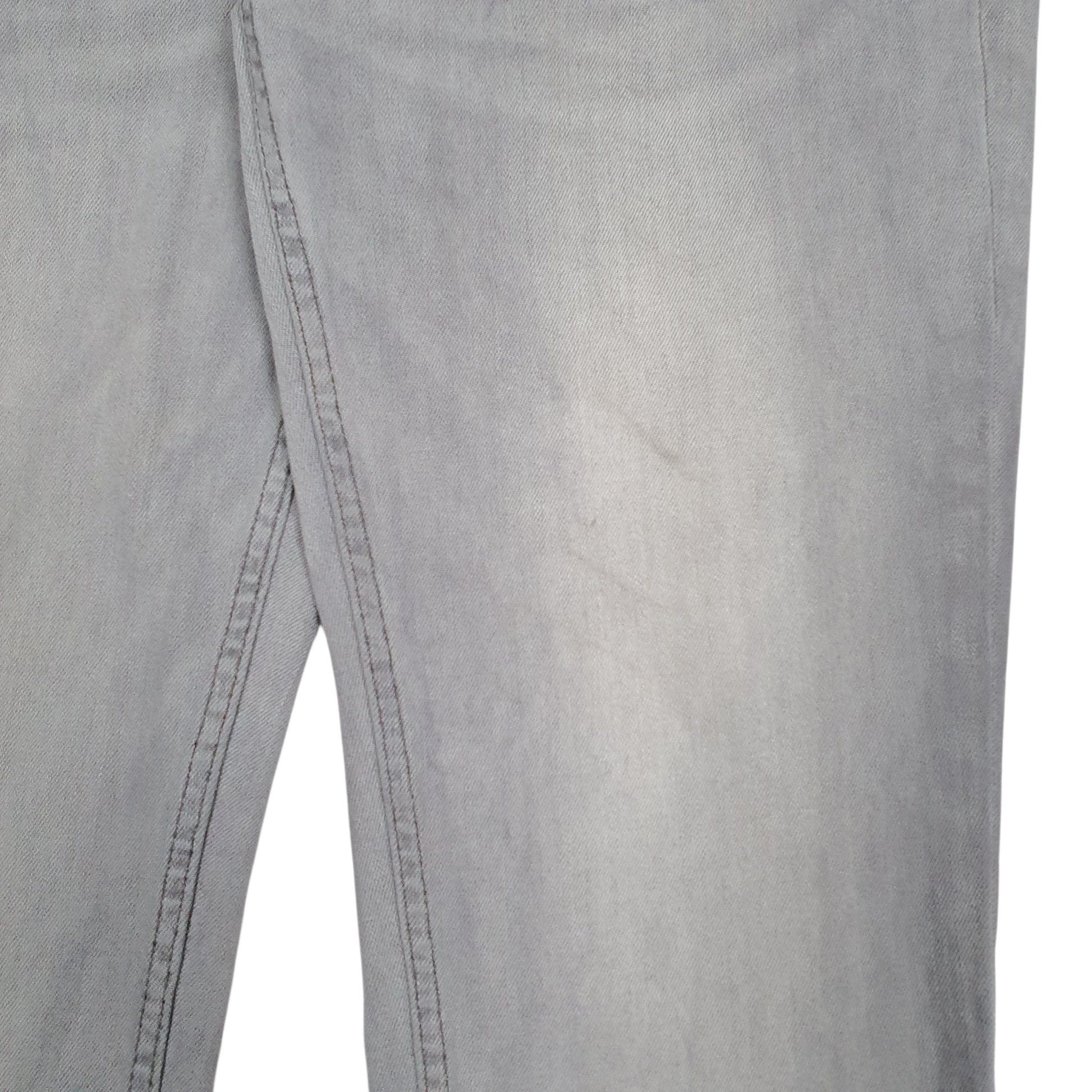 Mens Grey Levis Faint stain on the front left and back right.  Jeans
